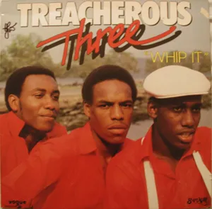 TREACHEROUS THREE-WHIP IT - COLOURED LP      (Arrives in 4 days )